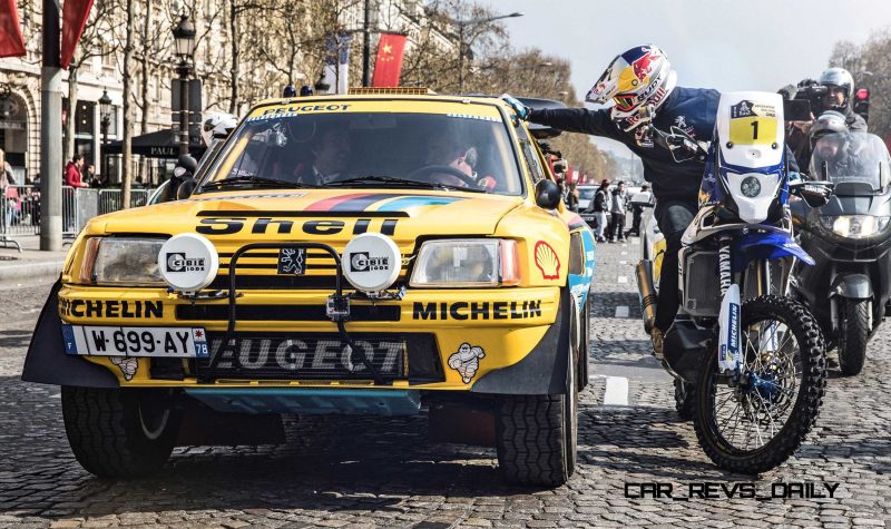 Cyril Despres speaks with Carlos Sainz on the Champs Elysees, Pa