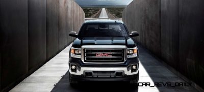 2014 GMC Sierra SLT Crew Cab in Iridium Metallic head on shot- on location