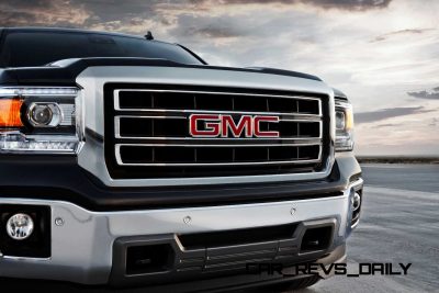 2014 GMC Sierra SLT Crew Cab in Iridium Metallic front end detail - on location