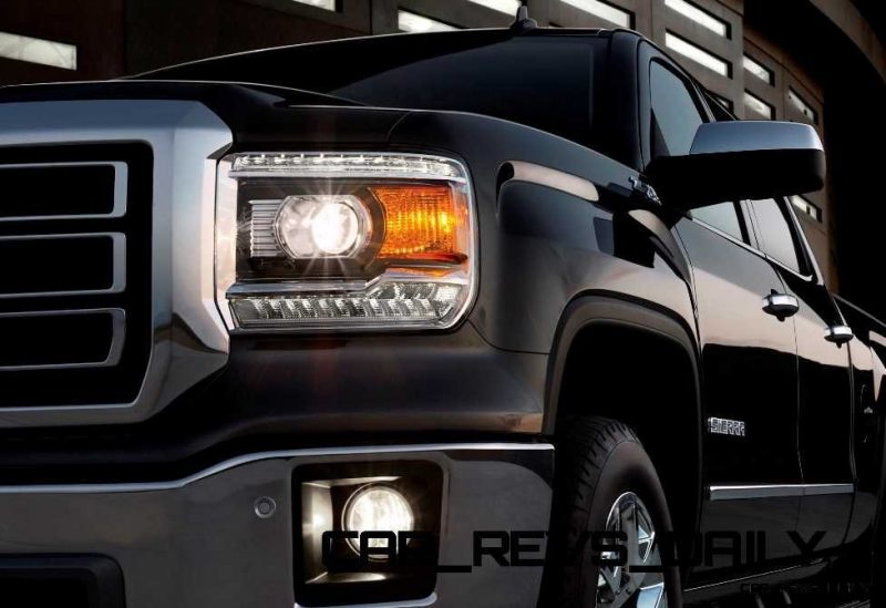 2014 GMC Sierra SLT Crew Cab in Iridium Metallic headlamp detail - on location