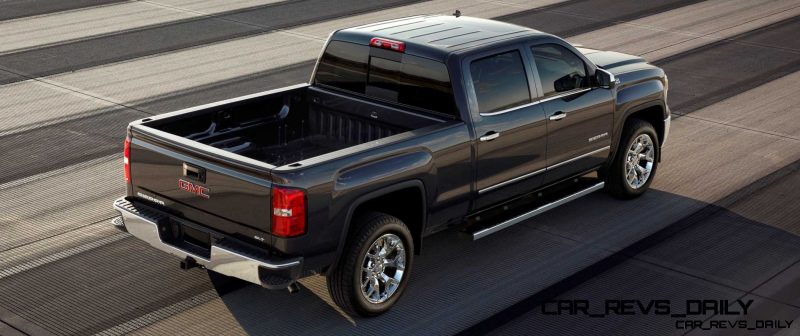 2014 GMC Sierra SLT Crew Cab in Iridium Metallic rear three quarter shot from above  - on location