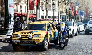 Cyril Despres speaks with Carlos Sainz on the Champs Elysees, Pa