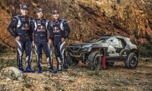 Carlos Sainz, Cyril Despres and  Stephane Peterhansel pose for a